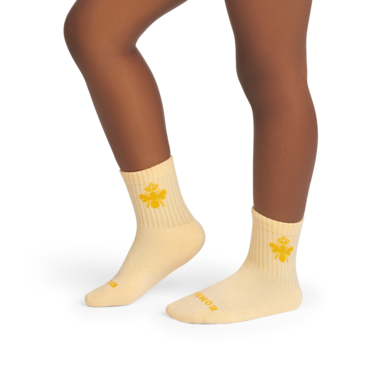 official-bombas::10121-meringue-softwhite-junior-unisex-onmodel-2-transparent.png