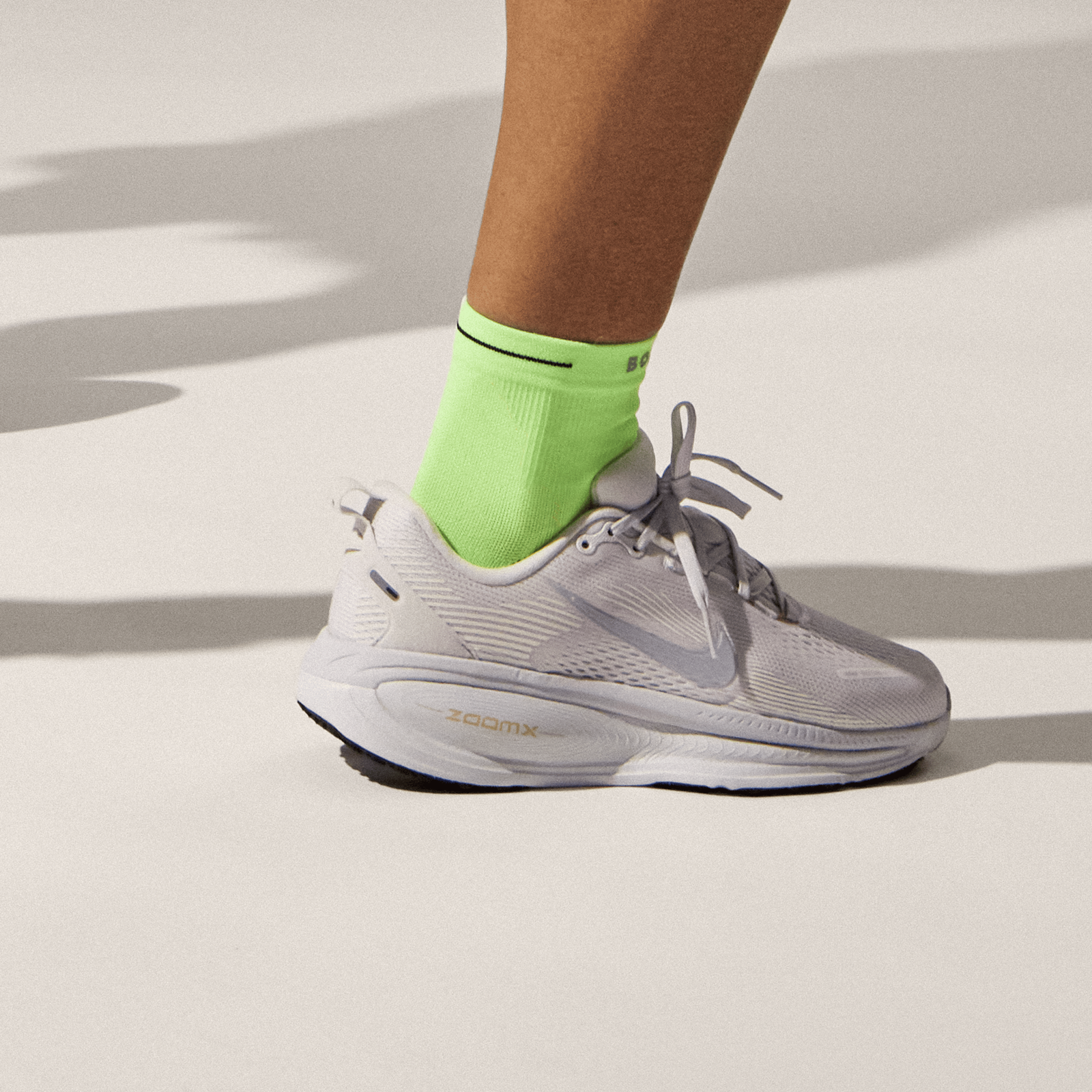 official-bombas::11061-neonlime-adult-unisex-onmodel-0-transparent.png