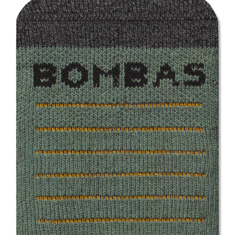 official-bombas::8876-black-adult-male-detail-4-transparent.png