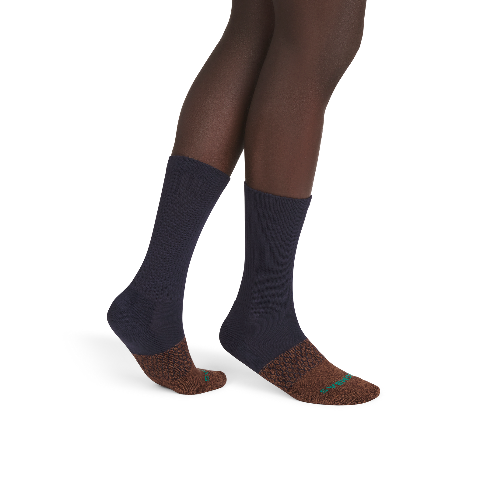 official-bombas::9817-darkespresso-midnightnavy-adult-male-onmodel-2-transparent.png
