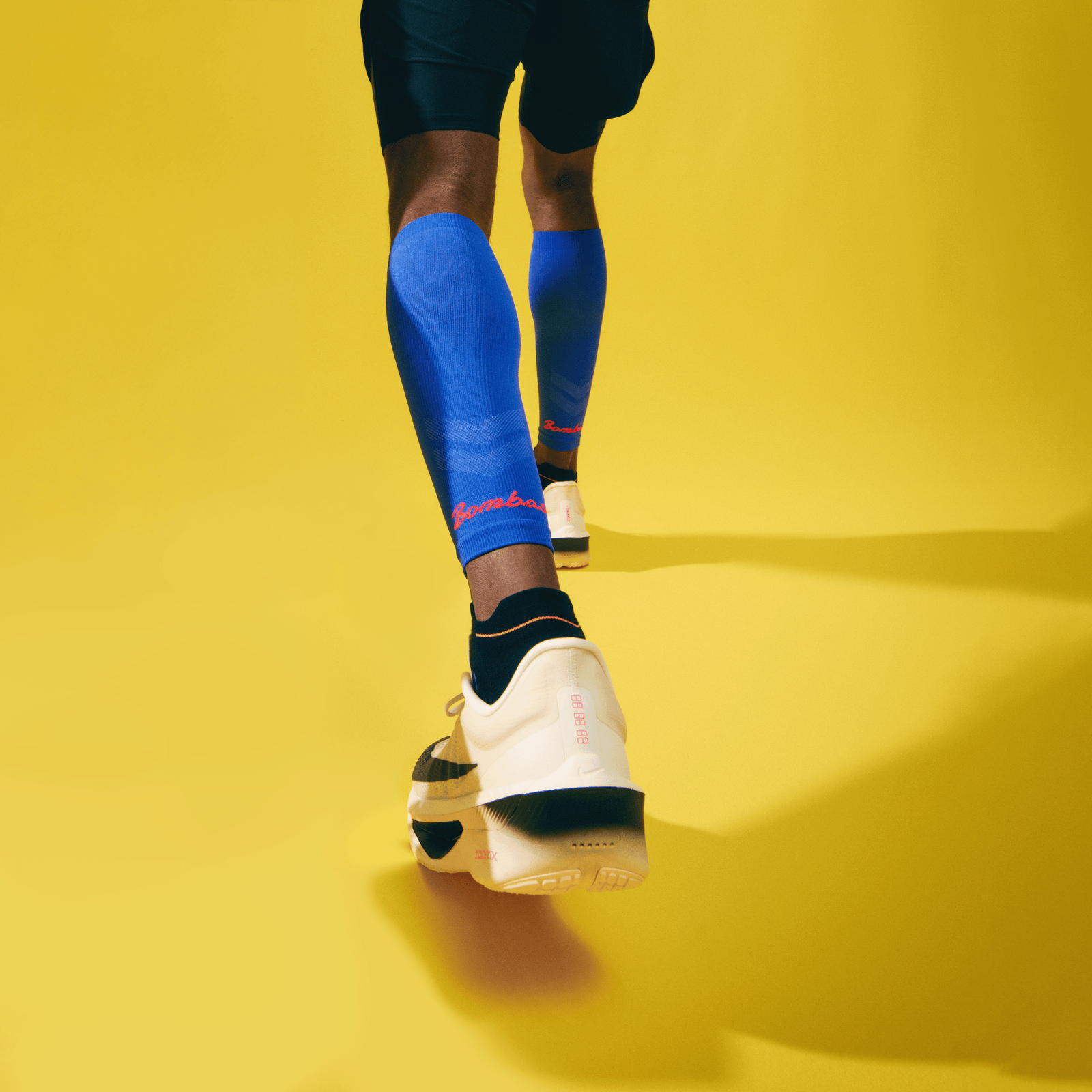 official-bombas::m-performance-compression-sleeve-lifestyle-transparent.png