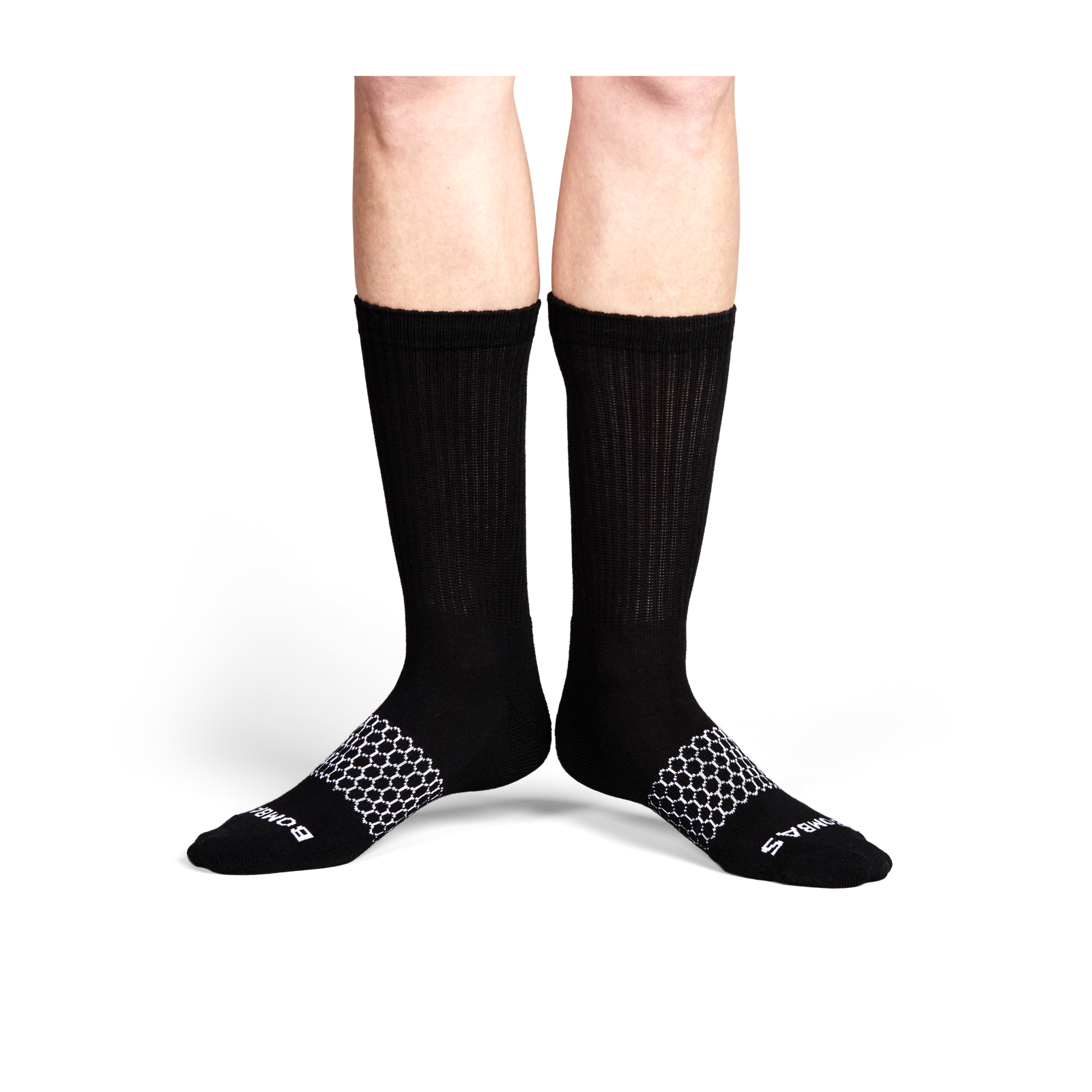 official-bombas::black-onmodel-3-transparent_743219f8-cdd3-40d8-b4e7-72e11aec9bc4.png